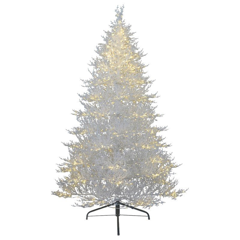 Albero di Natale bianco Vega LVG Design con mini LED caldi accesi sulla chioma candida