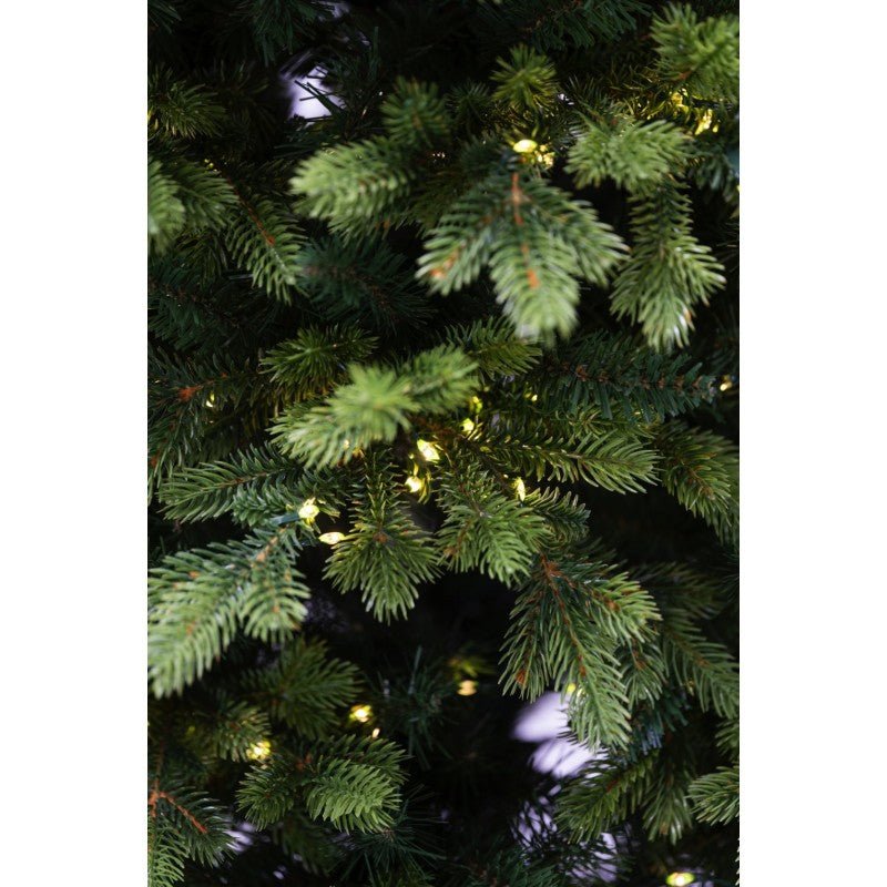 Altair, albero natalizio con tronco a vista effetto legno, punte sfumate e LED accesi – foto 7