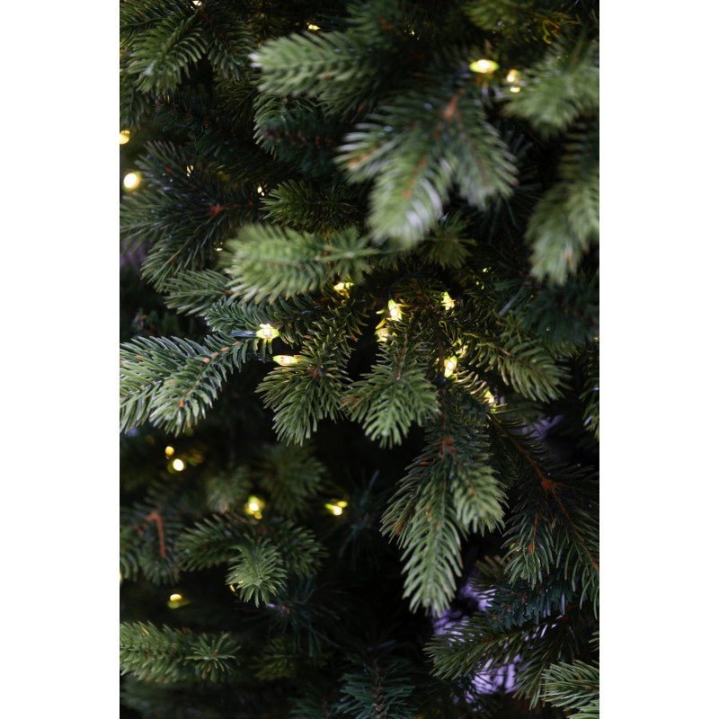 Altair, albero natalizio con tronco a vista effetto legno, punte sfumate e LED accesi – foto 4