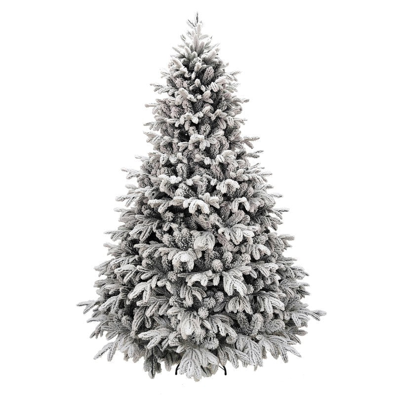 Courmayeur, albero di Natale innevato a piramide con neve fitta su rami folti